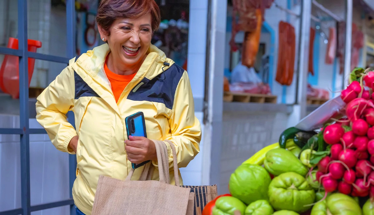 Woman smiling at farmers market