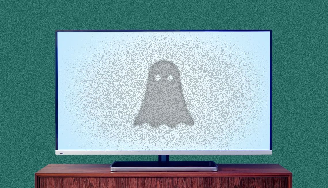 Tech Guru TV Burn In a ghost over static on a television