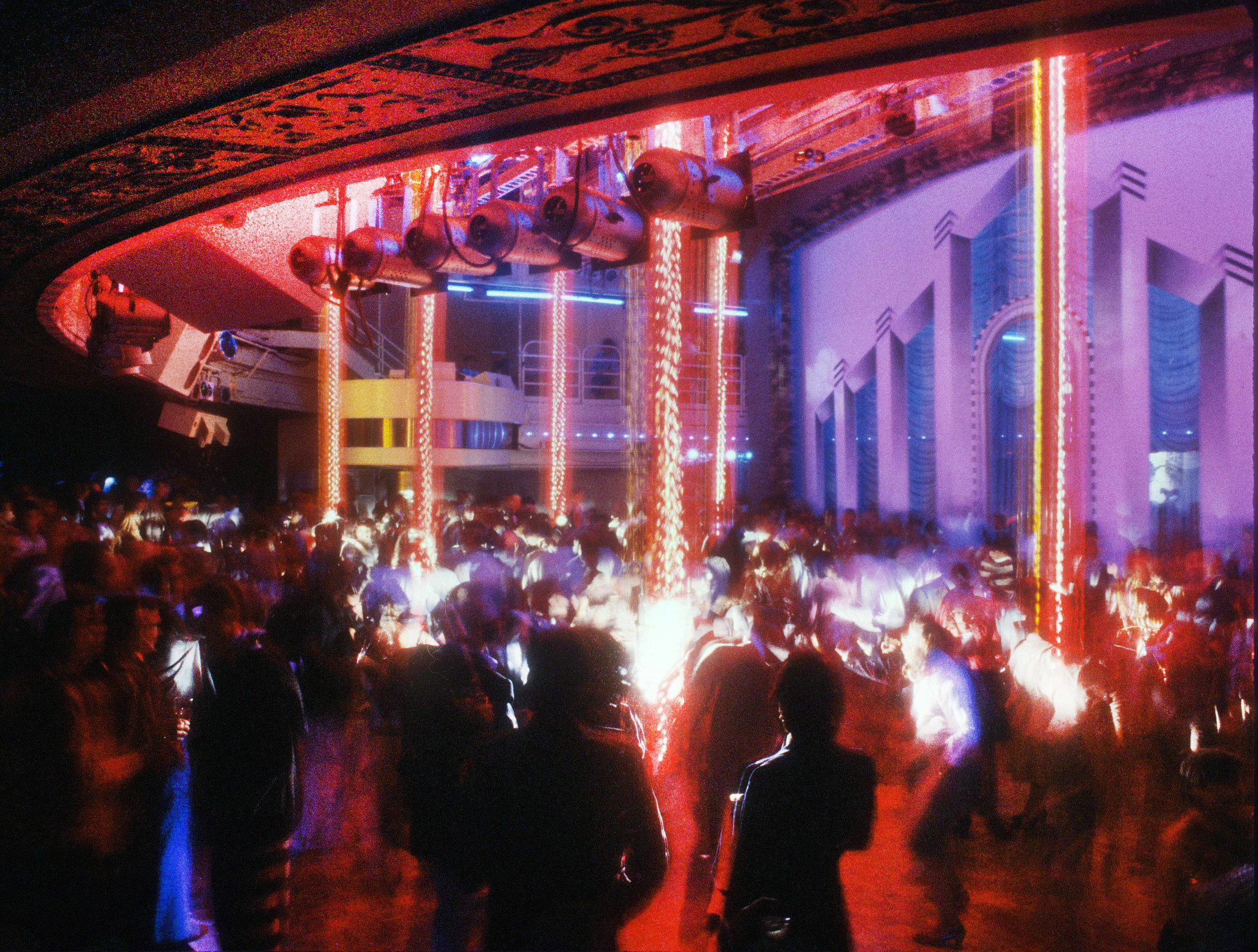 an inside view of studio 54 with a large number of club goers