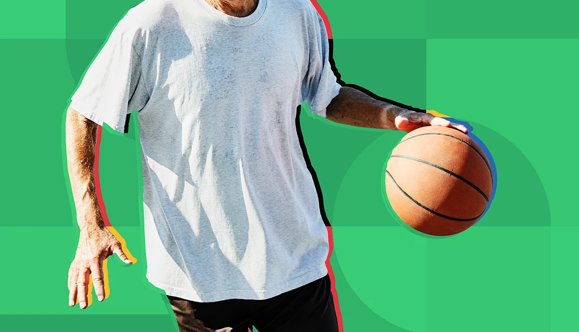 basketball is an example of a contact sport photo of a man dribbling a basketball on a green background