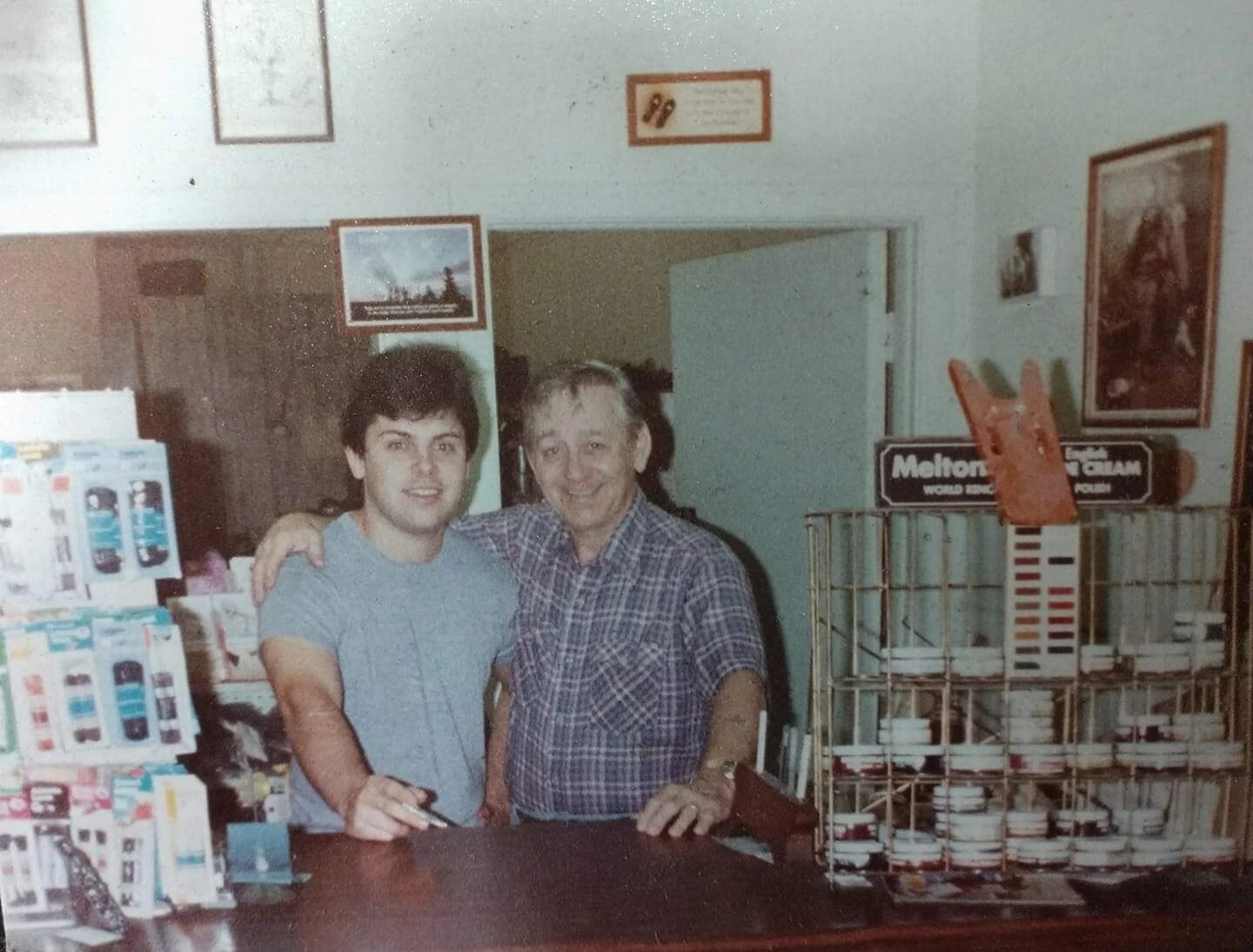 Jim McFarland stands next to his father