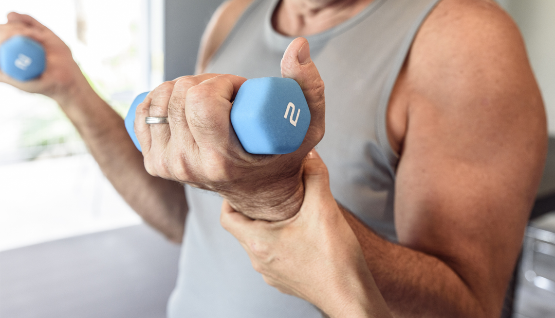 Aging Faster in Your 60s person curling weights