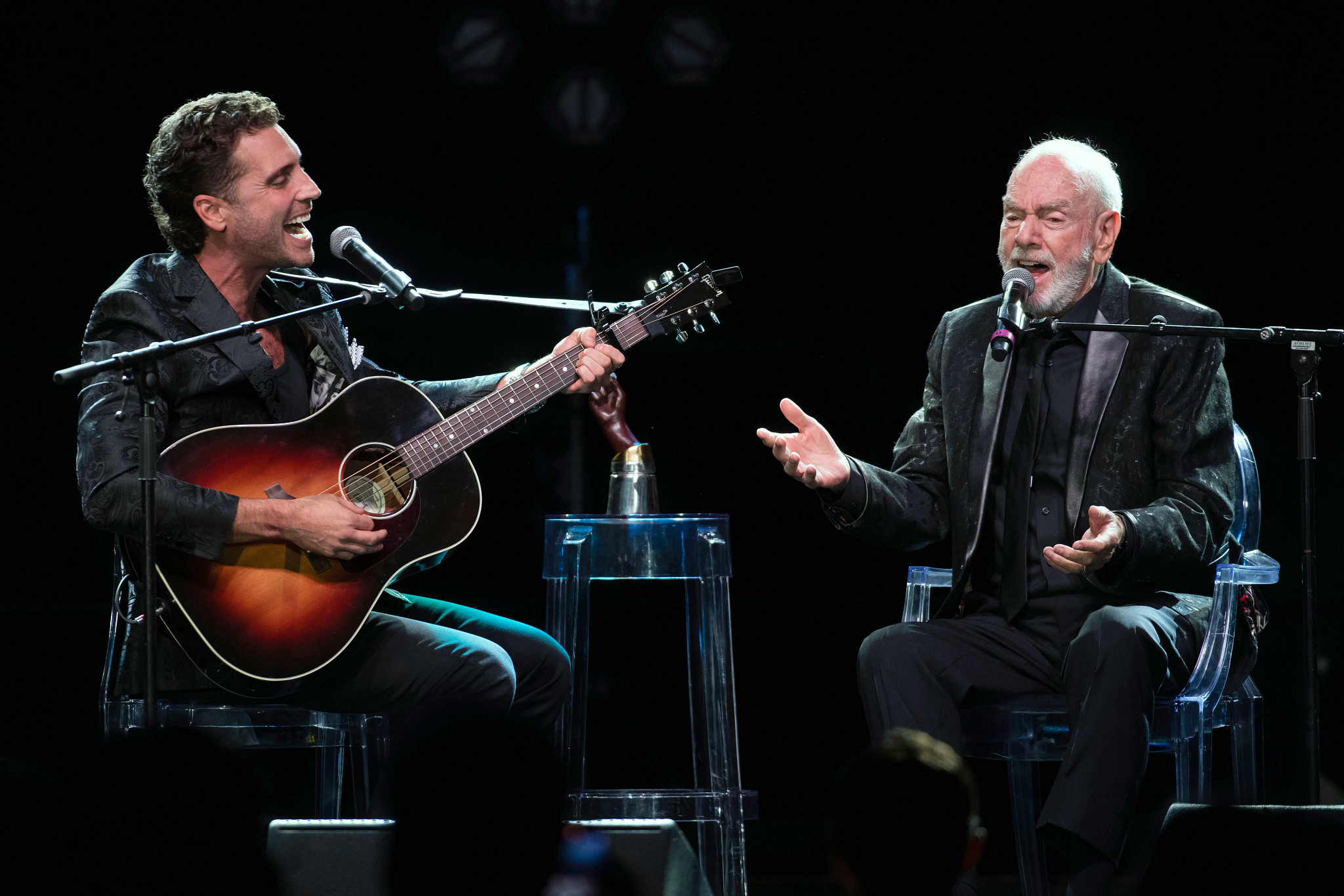 nick fradiani and neil diamond performing onstage