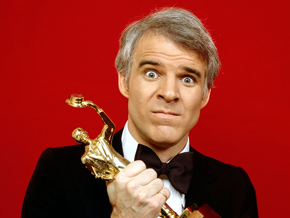 Steve Martin holding a trophy at The American Guild of Variety Artists 9th Annual Entertainer of the Year Awards