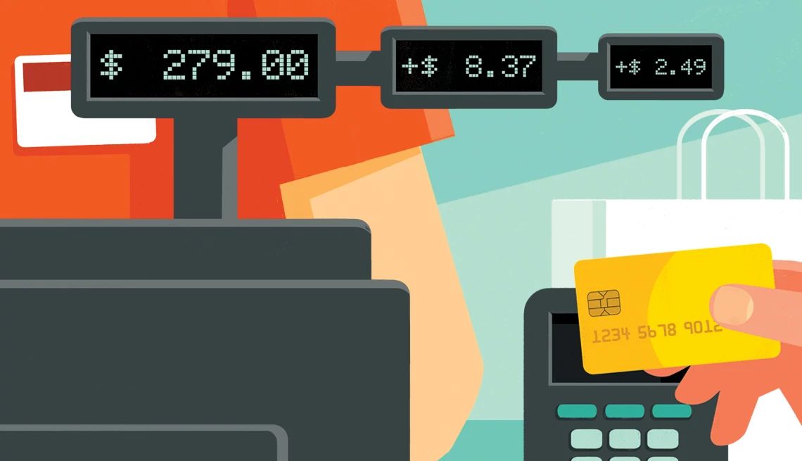 Why It’s Getting More Expensive to Use a Credit Card a cash register showing different fees for using a credit card
