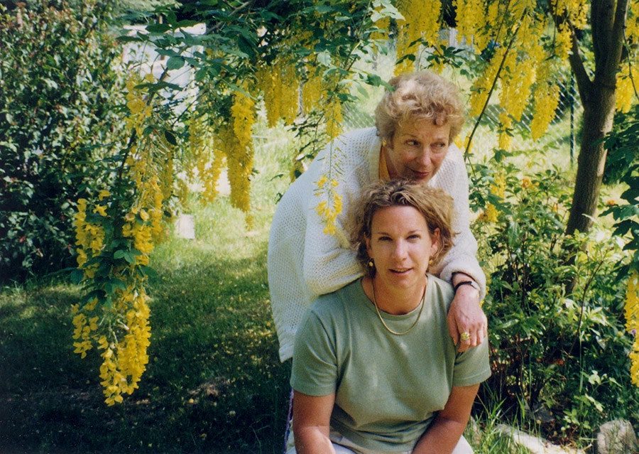 A photo shows Caitlin Kelly and her mother Cynthia in a lush garden in British Columbia