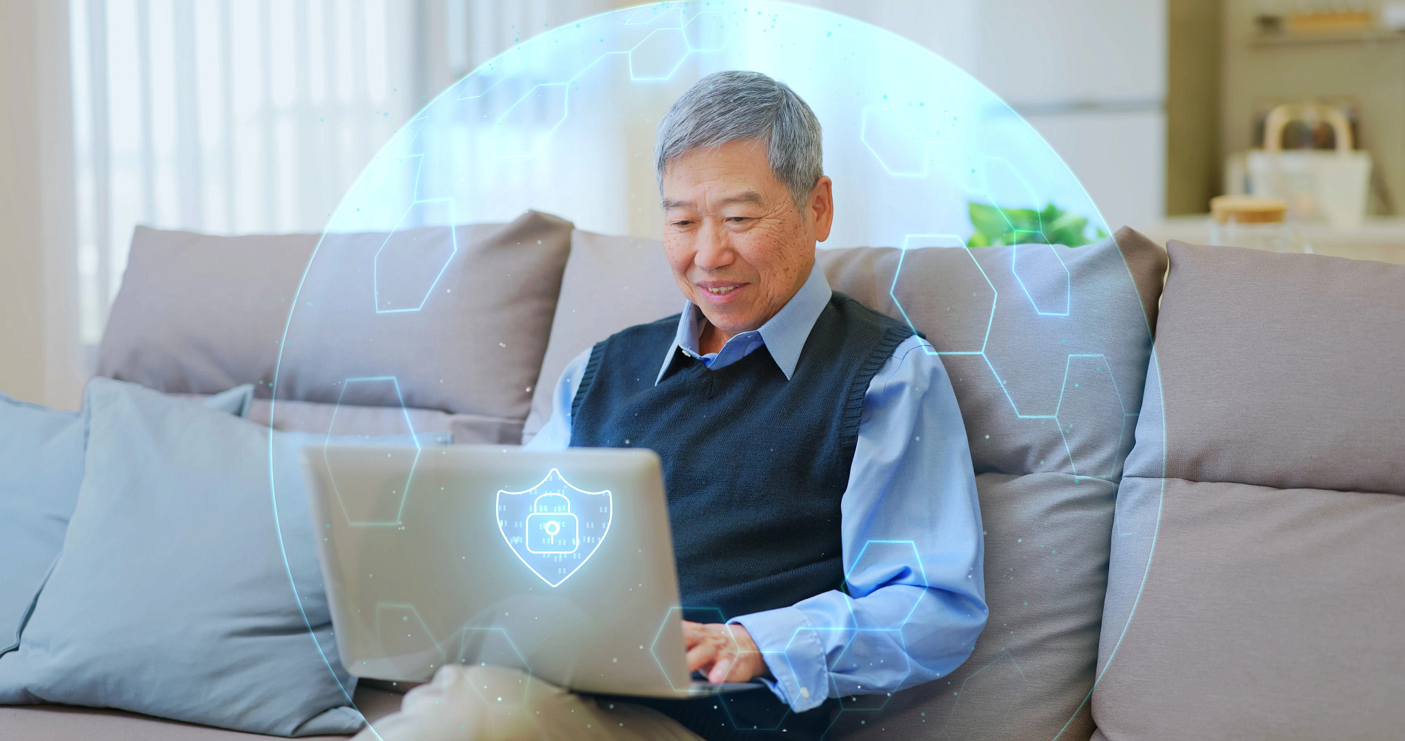Circle of Protection - asian senior man using laptop safe internet firewall protection concept in home living room