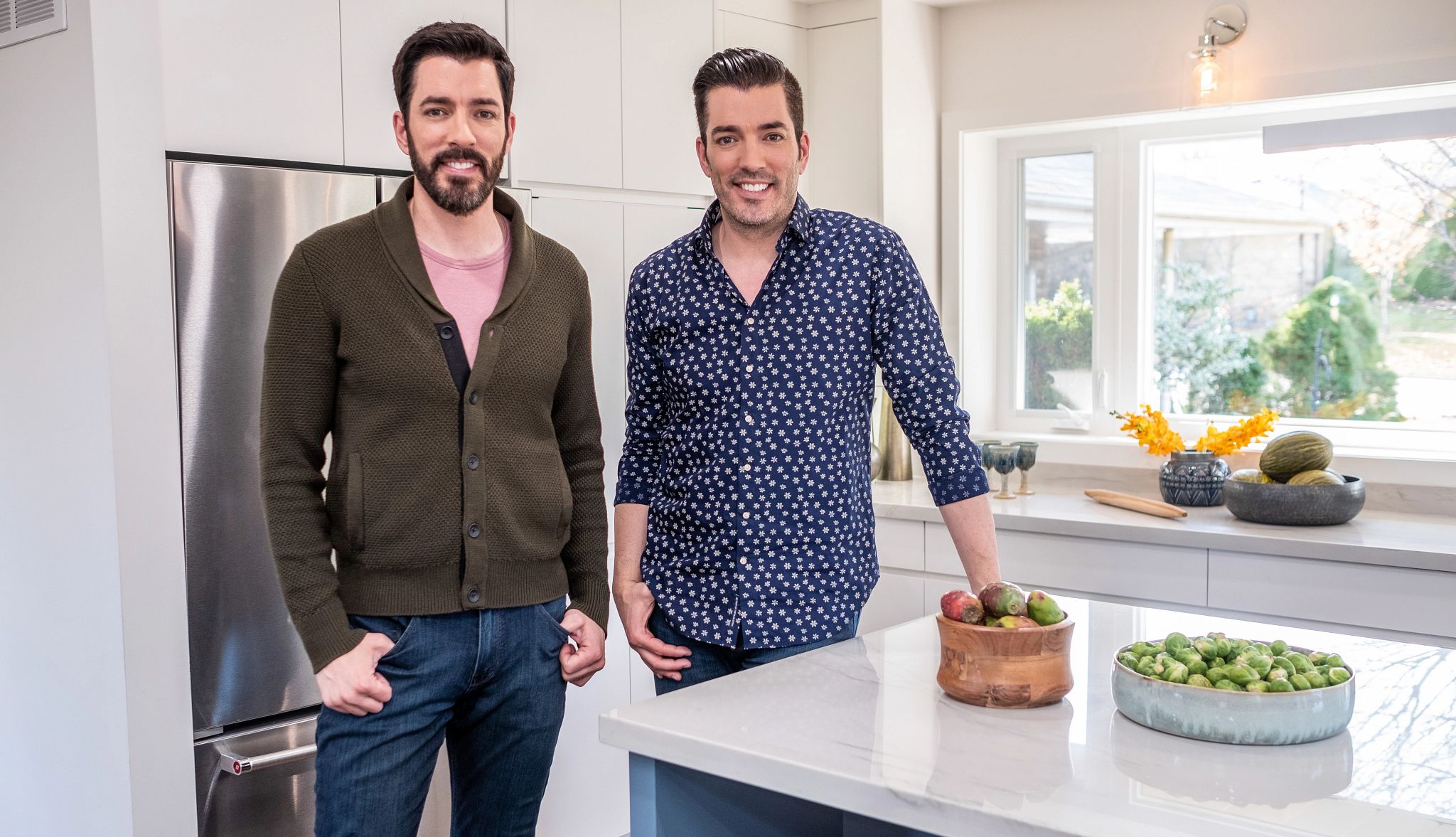 Property Brothers’ Home Tips Property Brothers stars Drew and Jonathan Scott are pictured in a gleaming kitchen, next to a counter with fresh produce displayed