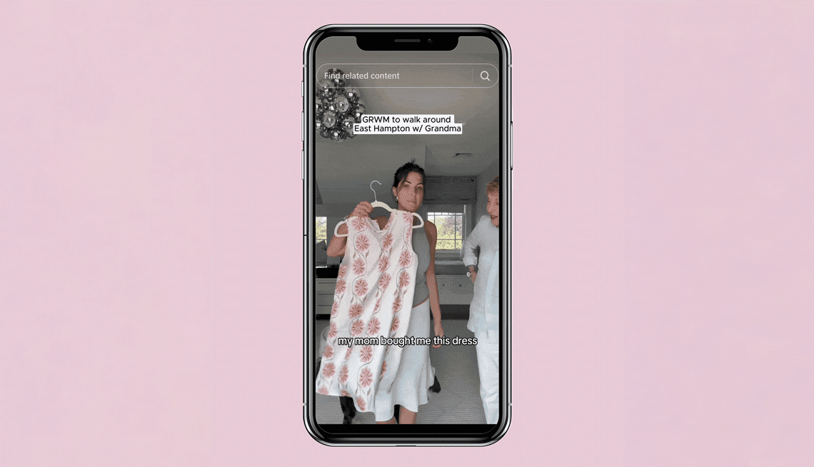 a gif shows Kim Murstein trying on a dress, getting advice from her grandmother Gail Rudnick