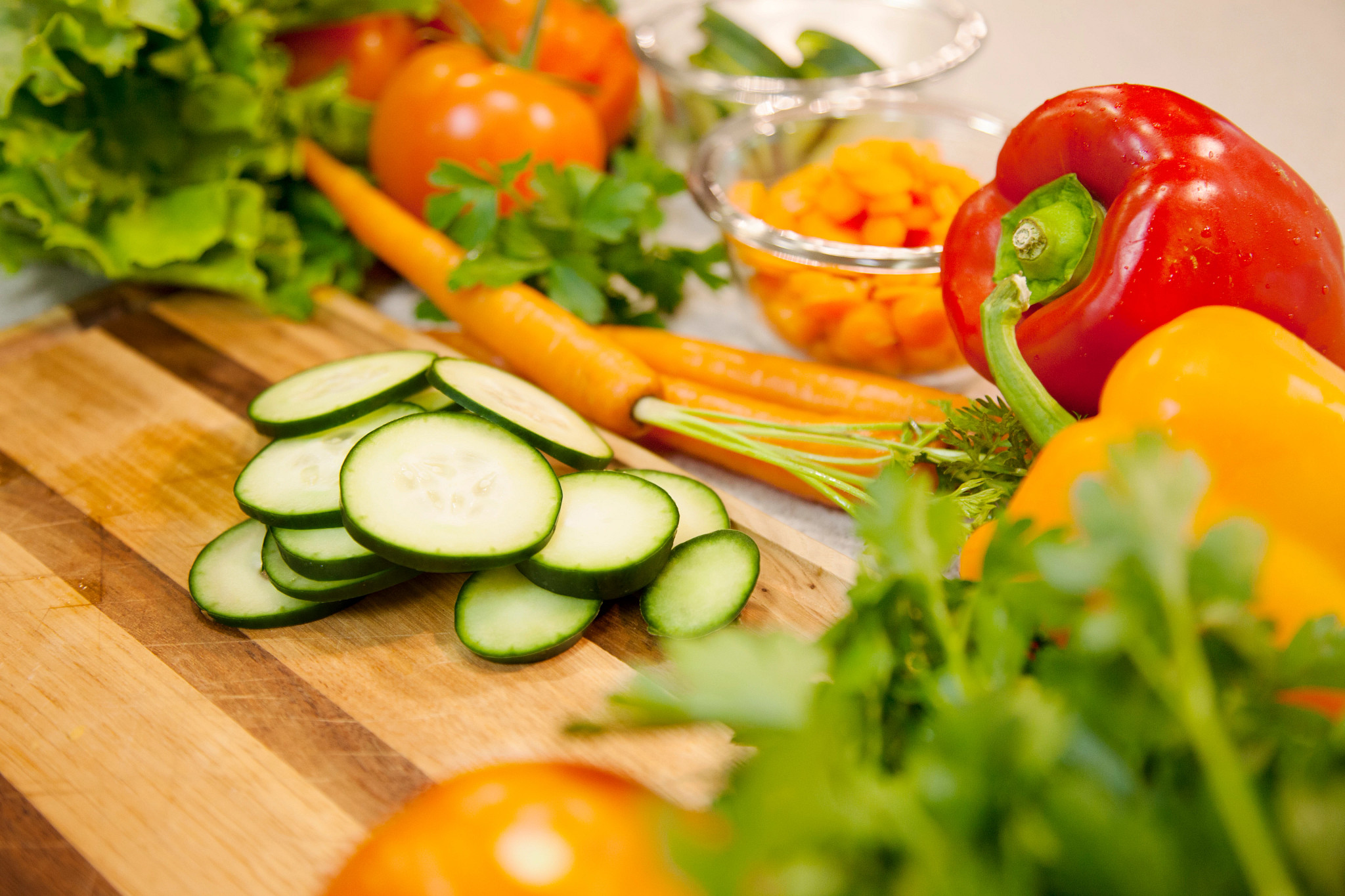 Senior women cooking and using tablet on the kitchen