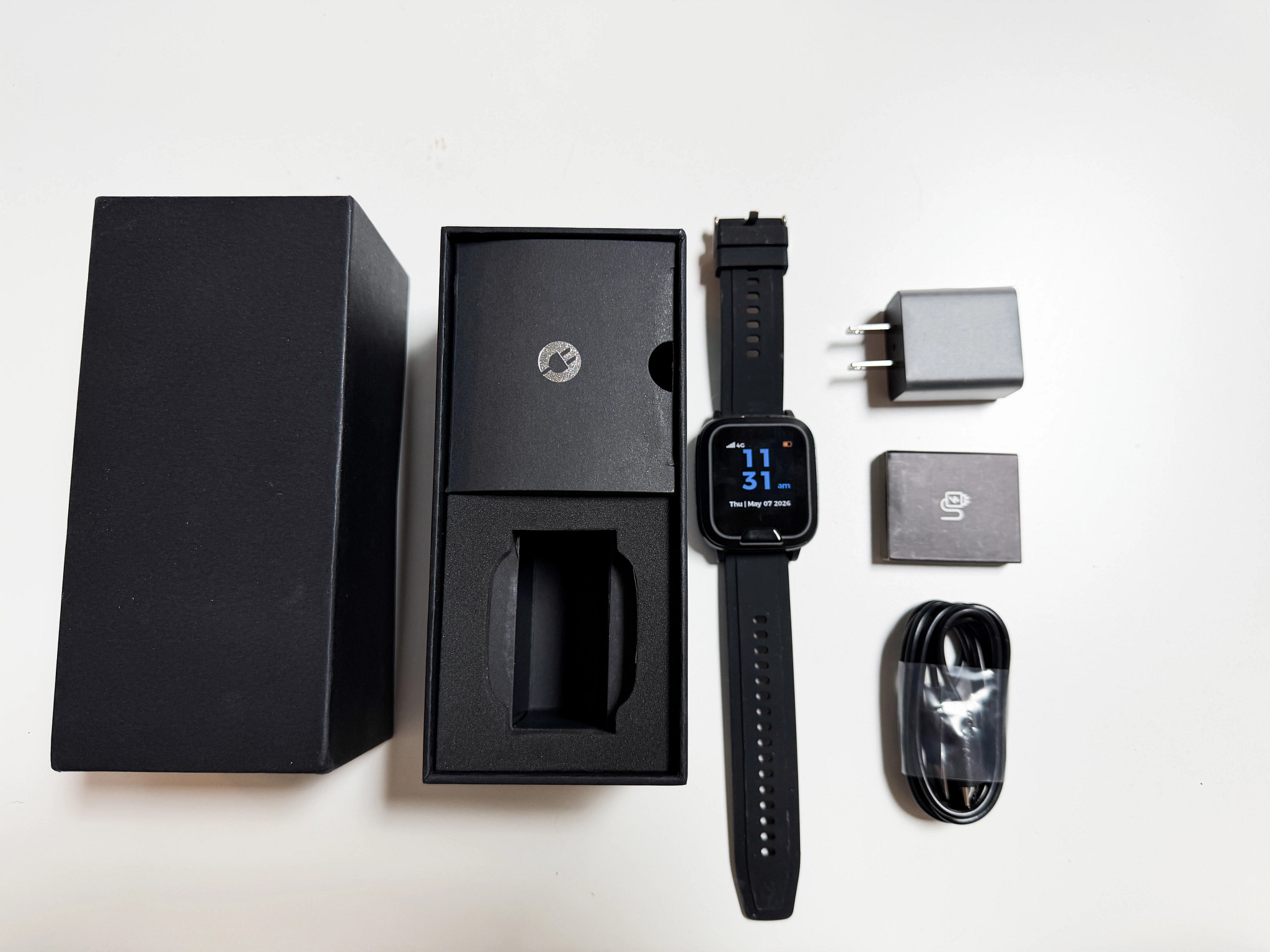 The Medical Alert Smartwatch and its packaging
