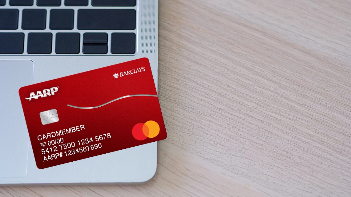 AARP Travel Rewards Mastercard from Barclays Credit card on laptop