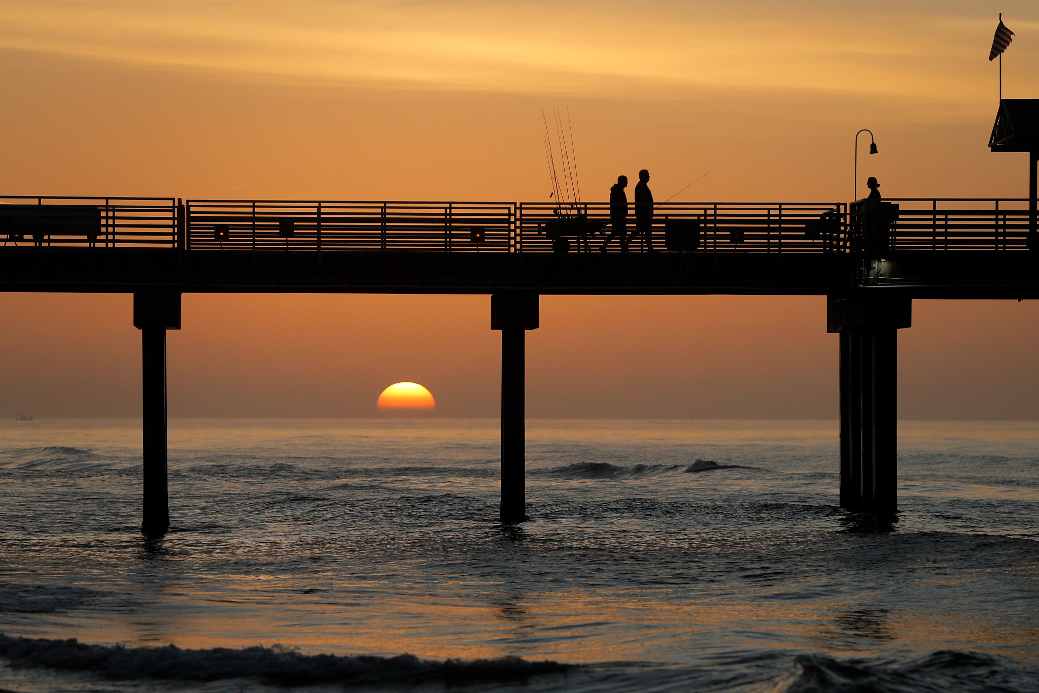 a sunset view of orange beach, alabama 