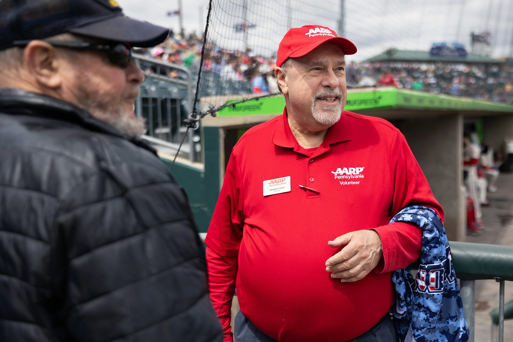 AARP volunteer Steve Orso speaks