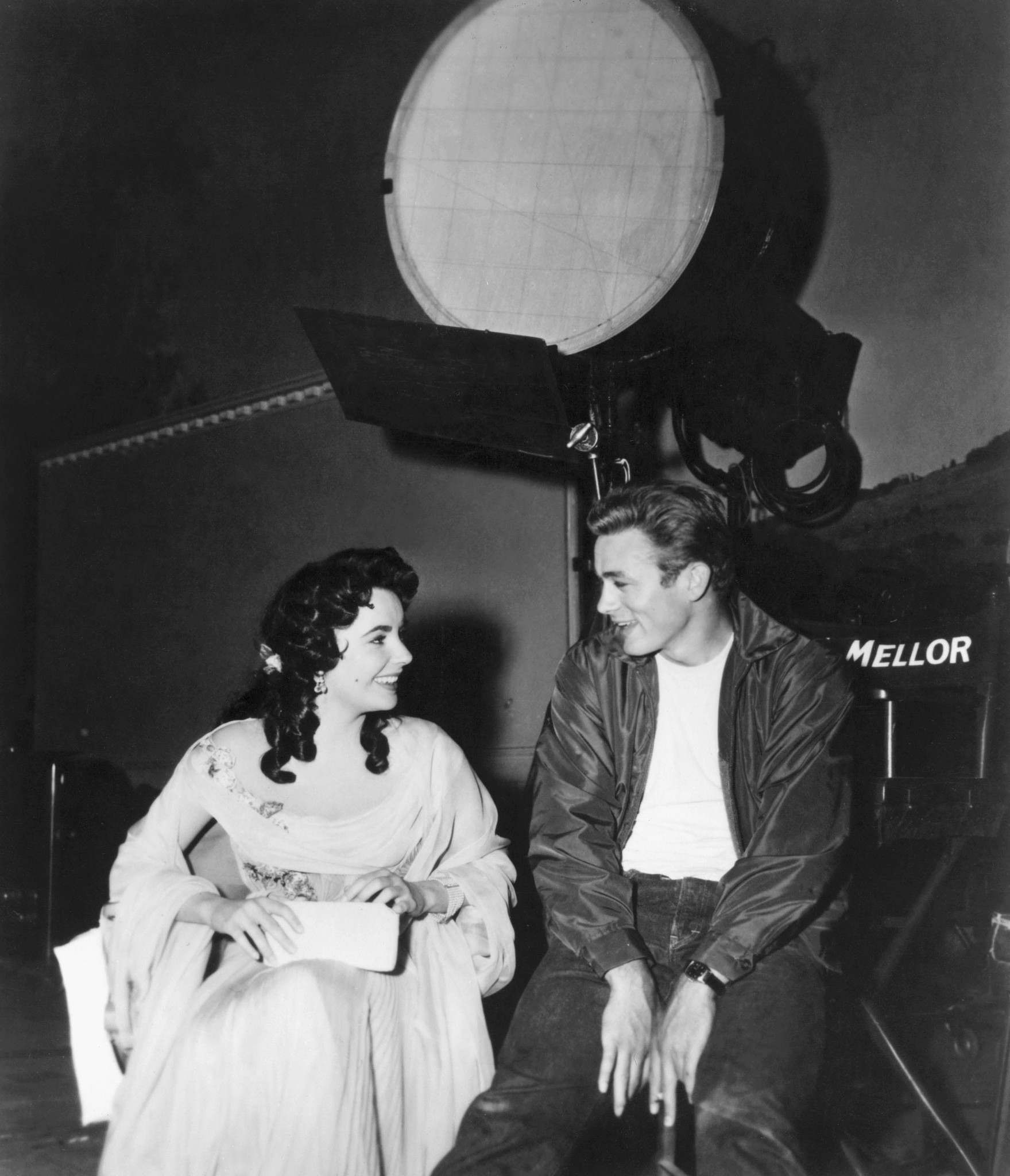 Elizabeth Taylor talking with James Dean on the set of the film Rebel Without a Cause