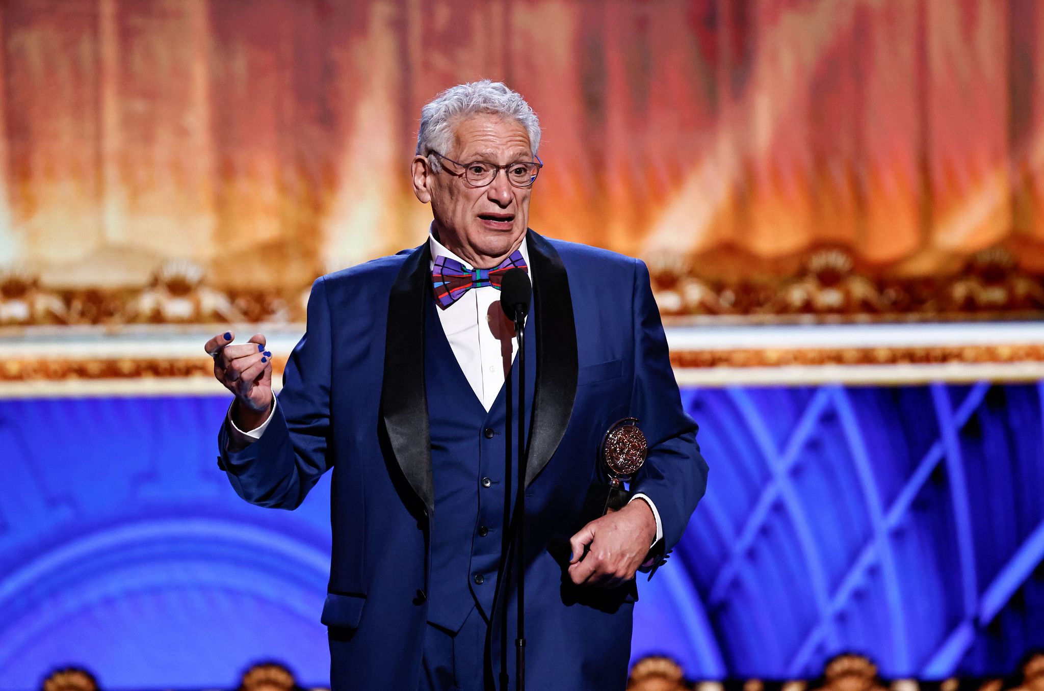 2025 Tony Award Highlights Harvey Fierstein speaking while holding his Lifetime Achievement Award