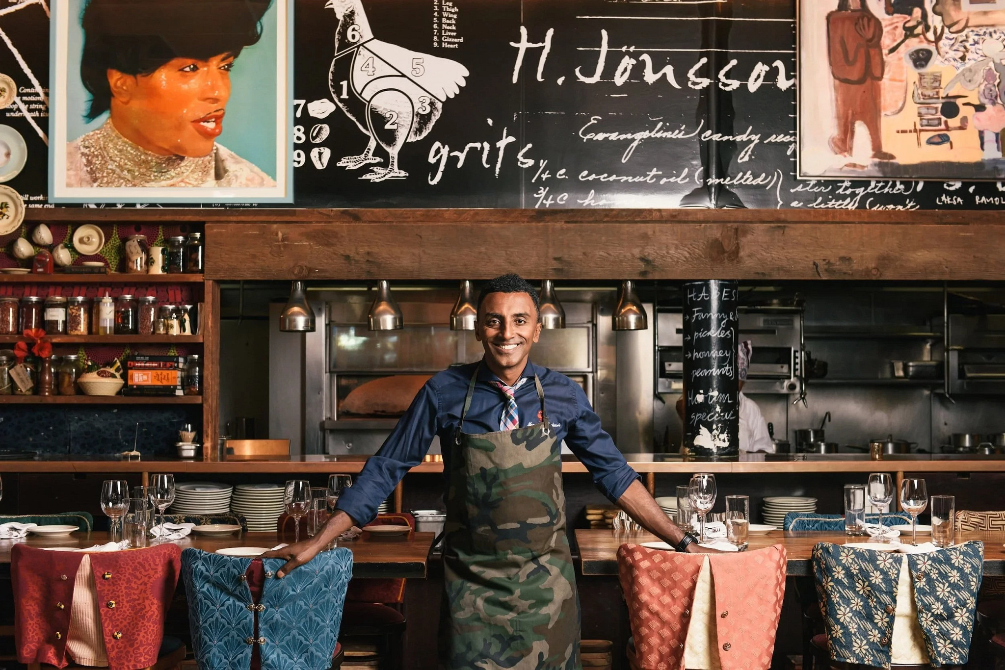 Chef Marcus Samuelsson posing for a picture at his restaurant 