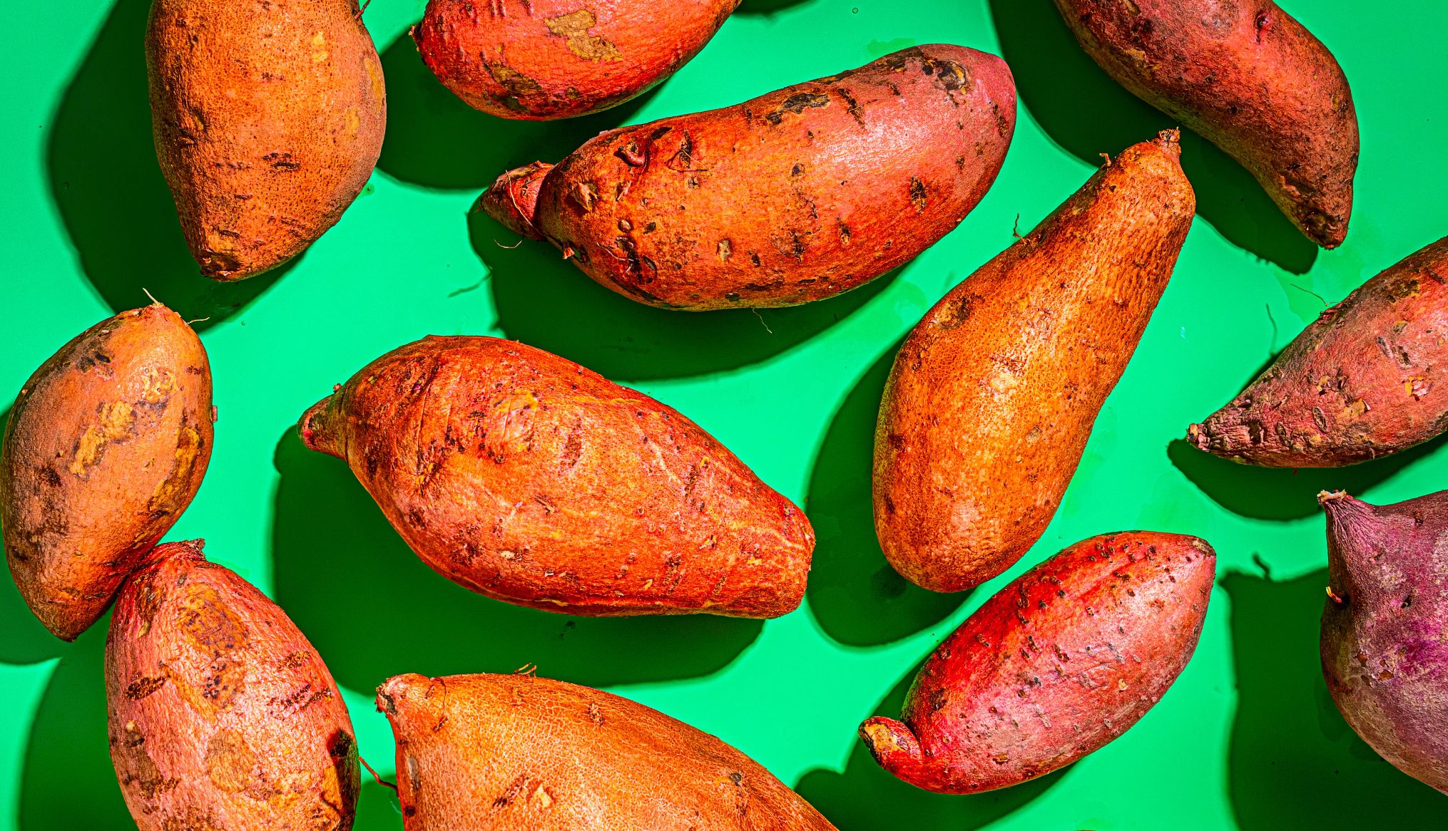 sweet potatoes can be frozen sweet potatos on a green background