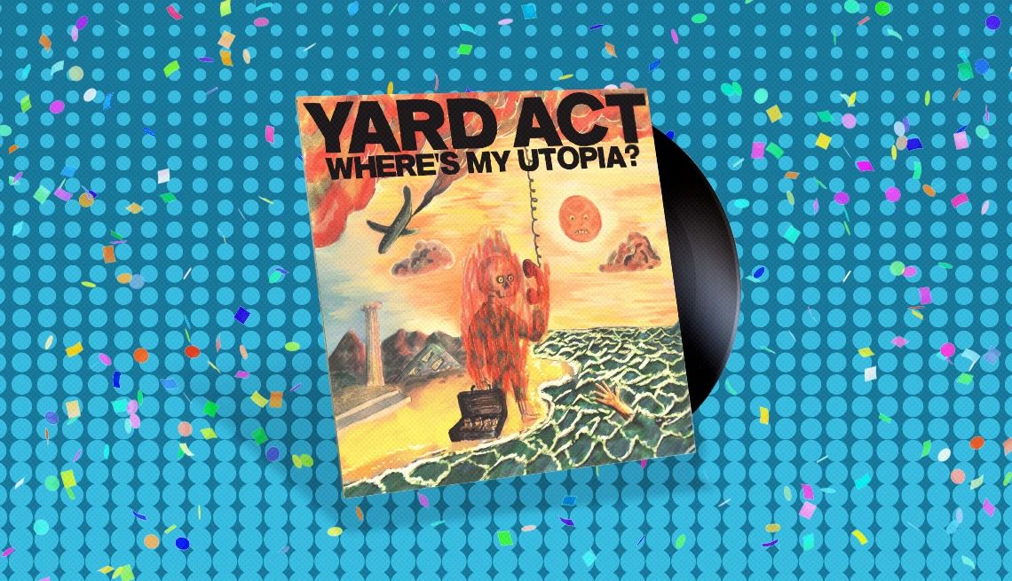 Yard Act's “Where’s My Utopia?” Album cover with record sticking out of it and the words Yard Act Where’s My Utopia on cover; blue background with confetti on it