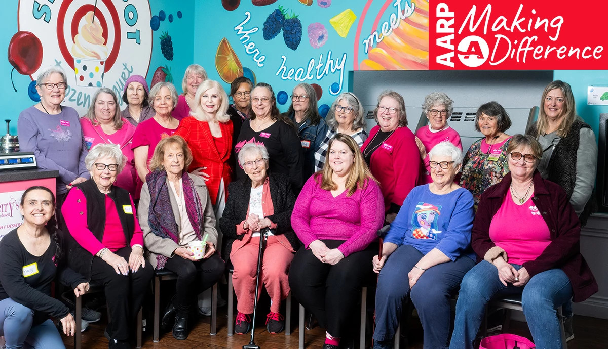 a group of older women posing for a photo at an a a r p ethels gathering