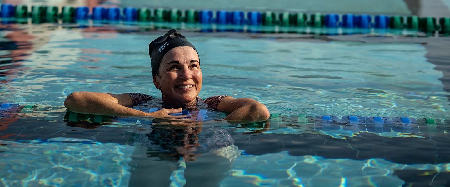 How One Woman Faced Her Fear and Learned to Swim a woman in a swimming pool