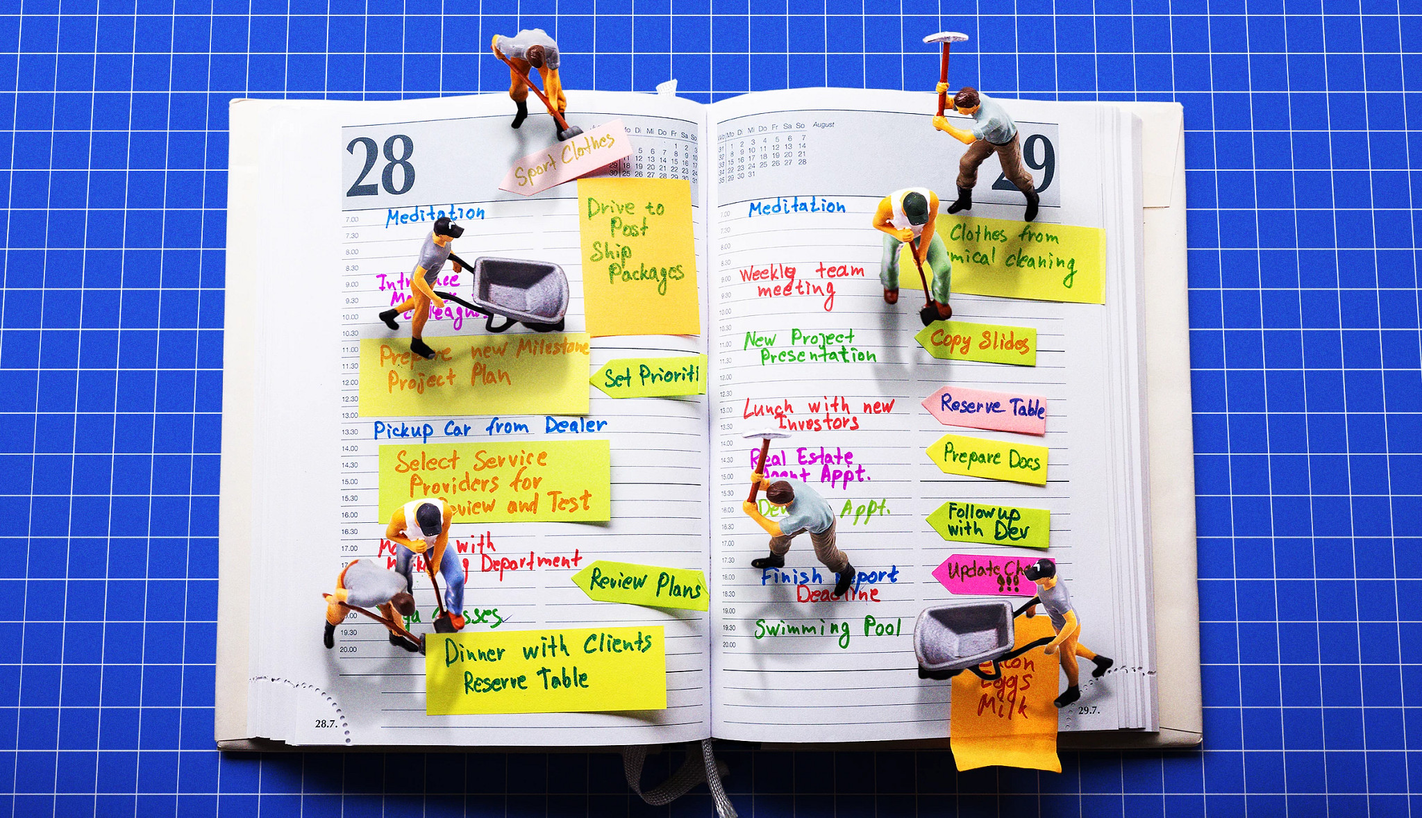 Toy construction workers toil over a life-sized schedule planner using shovels and pick-axes to move sticky notes.