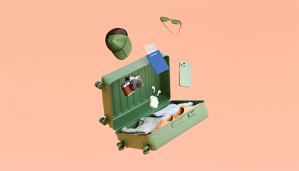 vacation packing guide illustration/gif of an open suit case with various items falling inside