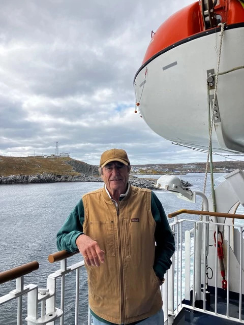 travel writer Paul Theroux poses on a ferry