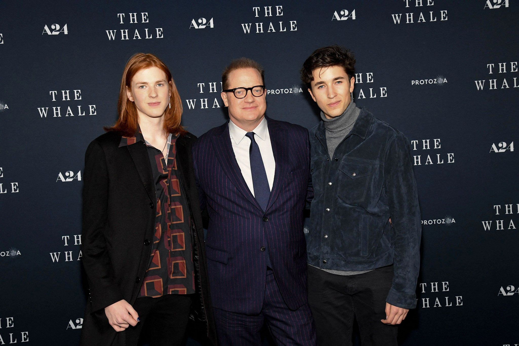 Leland Fraser, Brendan Fraser and Holden Fraser posing for a group portrait