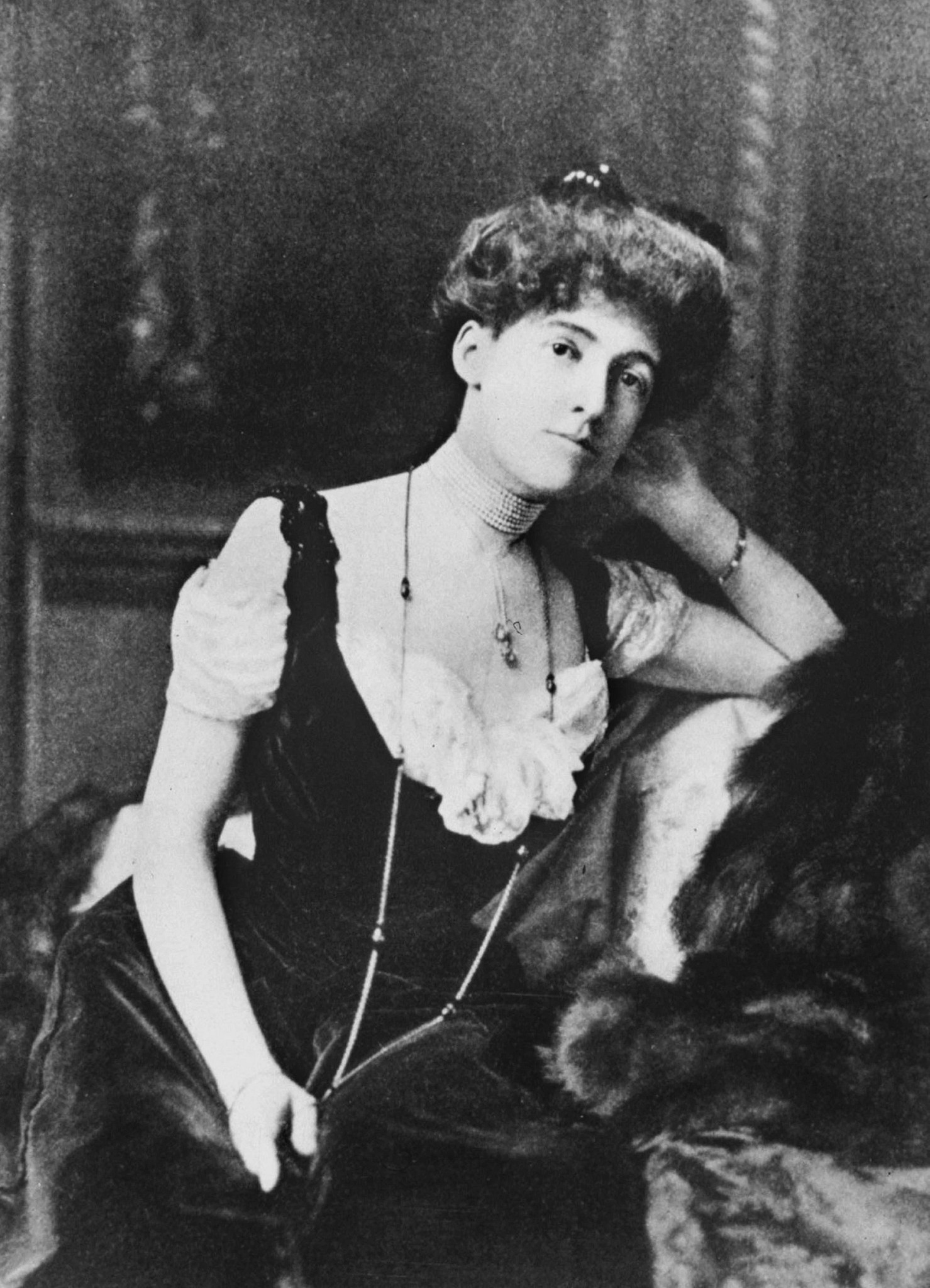 edith wharton as a young woman, posing for a portrait in formal dress