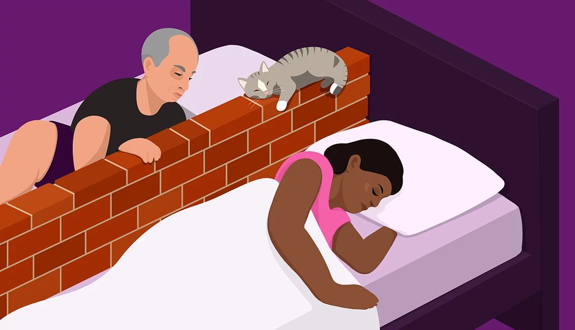 How to Talk to a Partner About Sex Acts You Don’t Want two people lay in bed with a brick wall between them