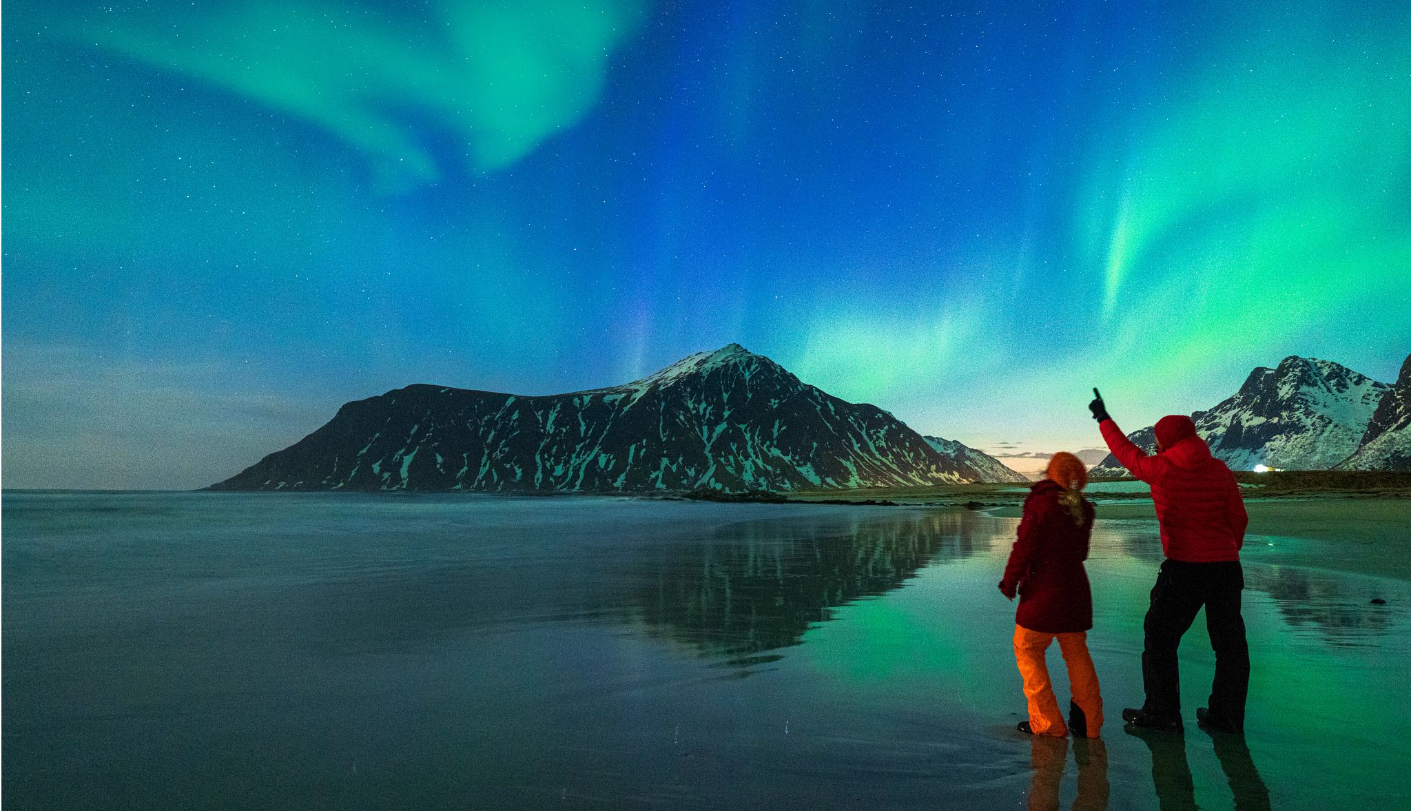There's a chance you may not get to see the Northern Lights a couple observing the Northern Lights