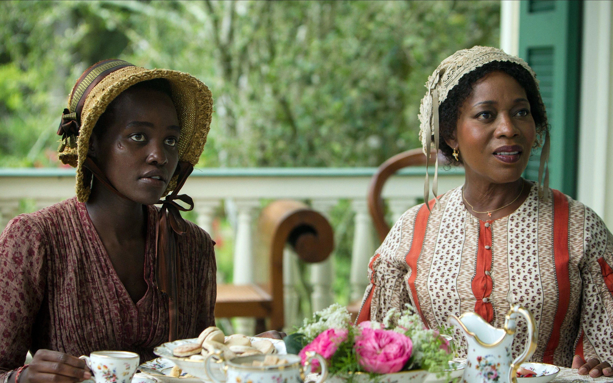alfre woodard and lupita n'yongo in a scene from twelve years a slave