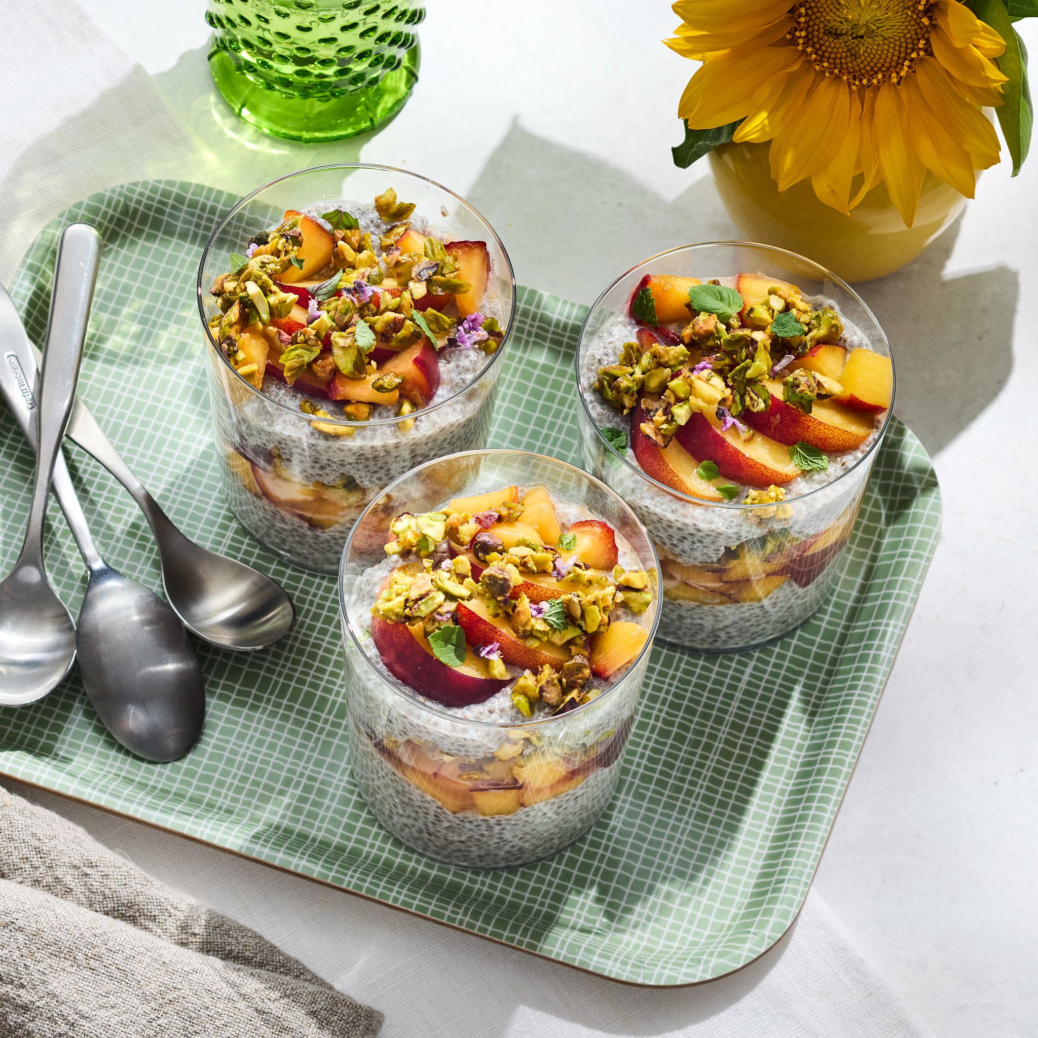 Farmers Market Menu peach chia custard parfait with pistachio crunch is pictured