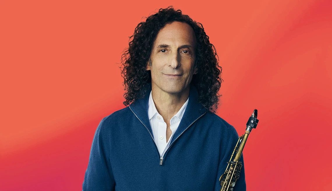 Kenny G interview Kenny G against orange pinkish ombre background