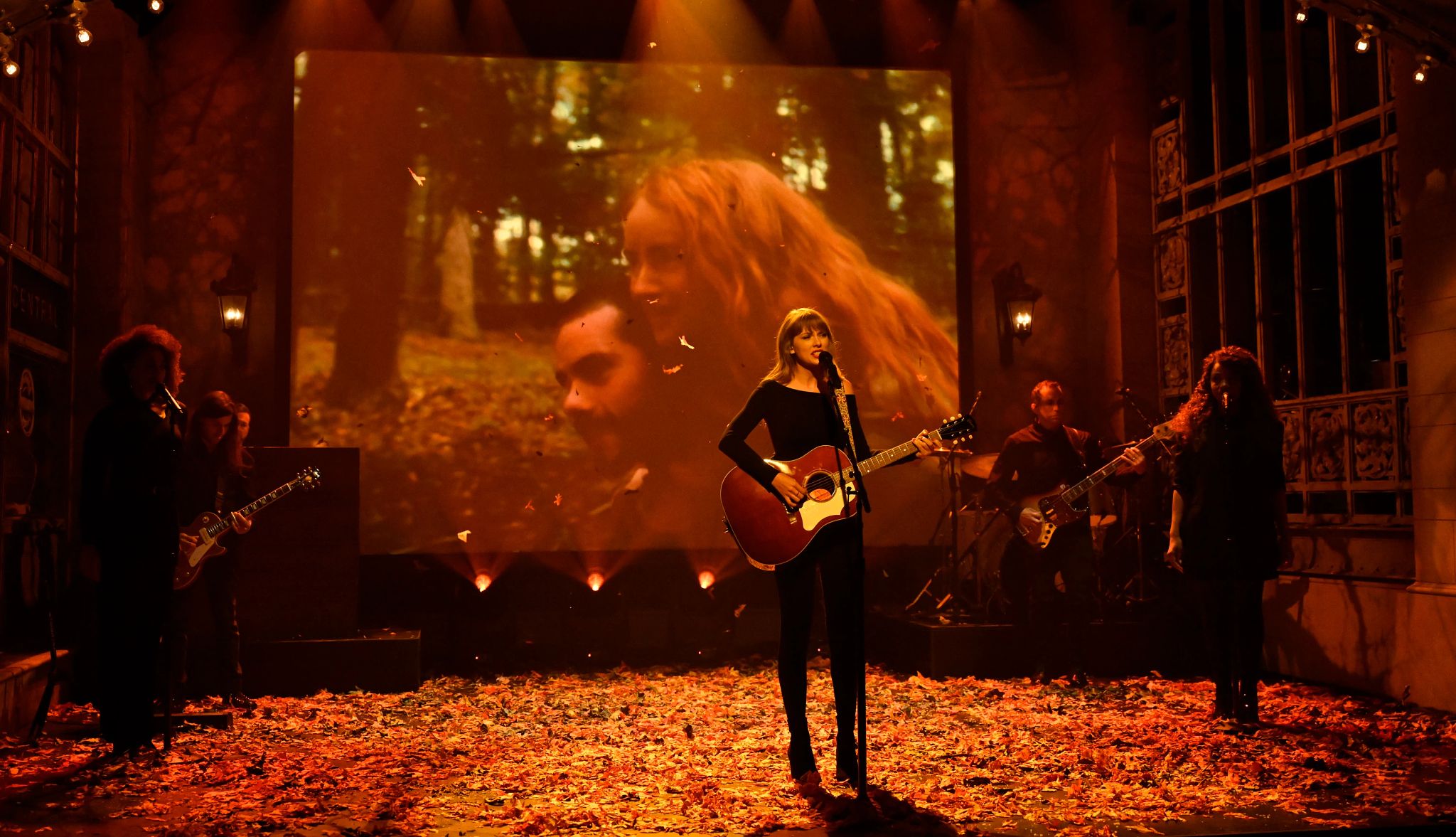 Taylor Swift Taylor Swift playing the guitar during her performance on Saturday Night Live