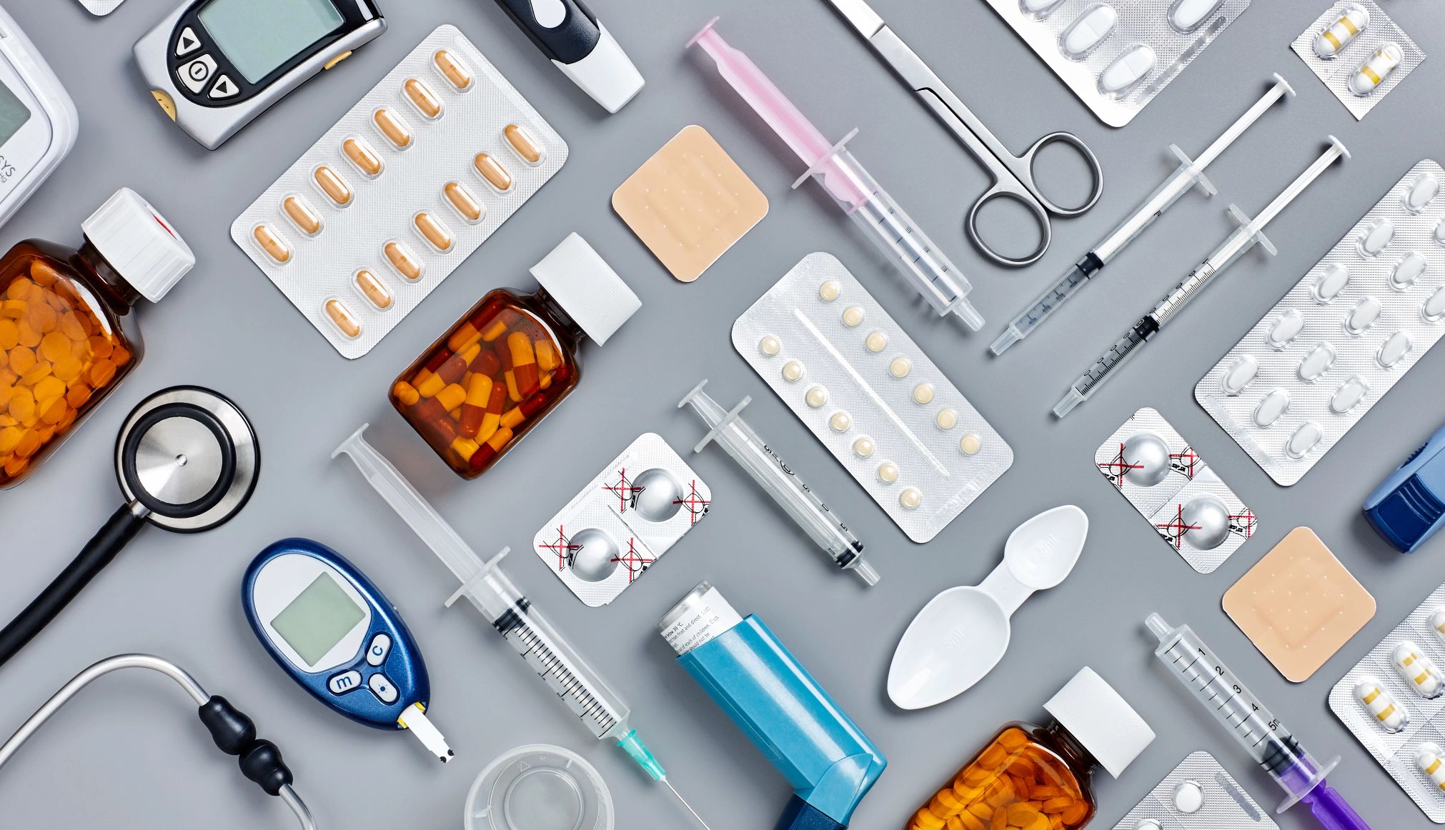 Medicine Cabinet Essentials various pills, syringes and medicines