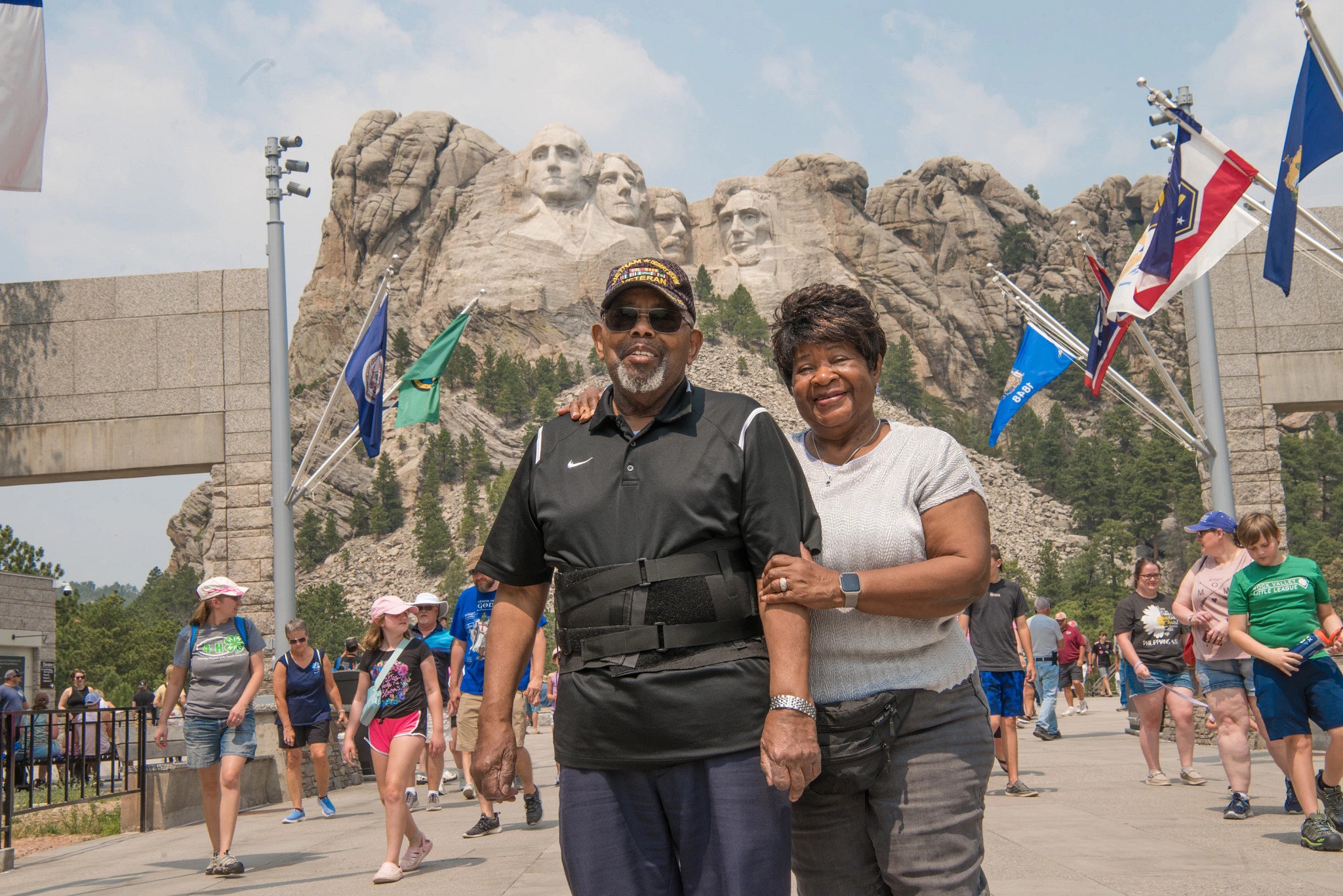 robert mccauley smiling beside another person at mount rushmore