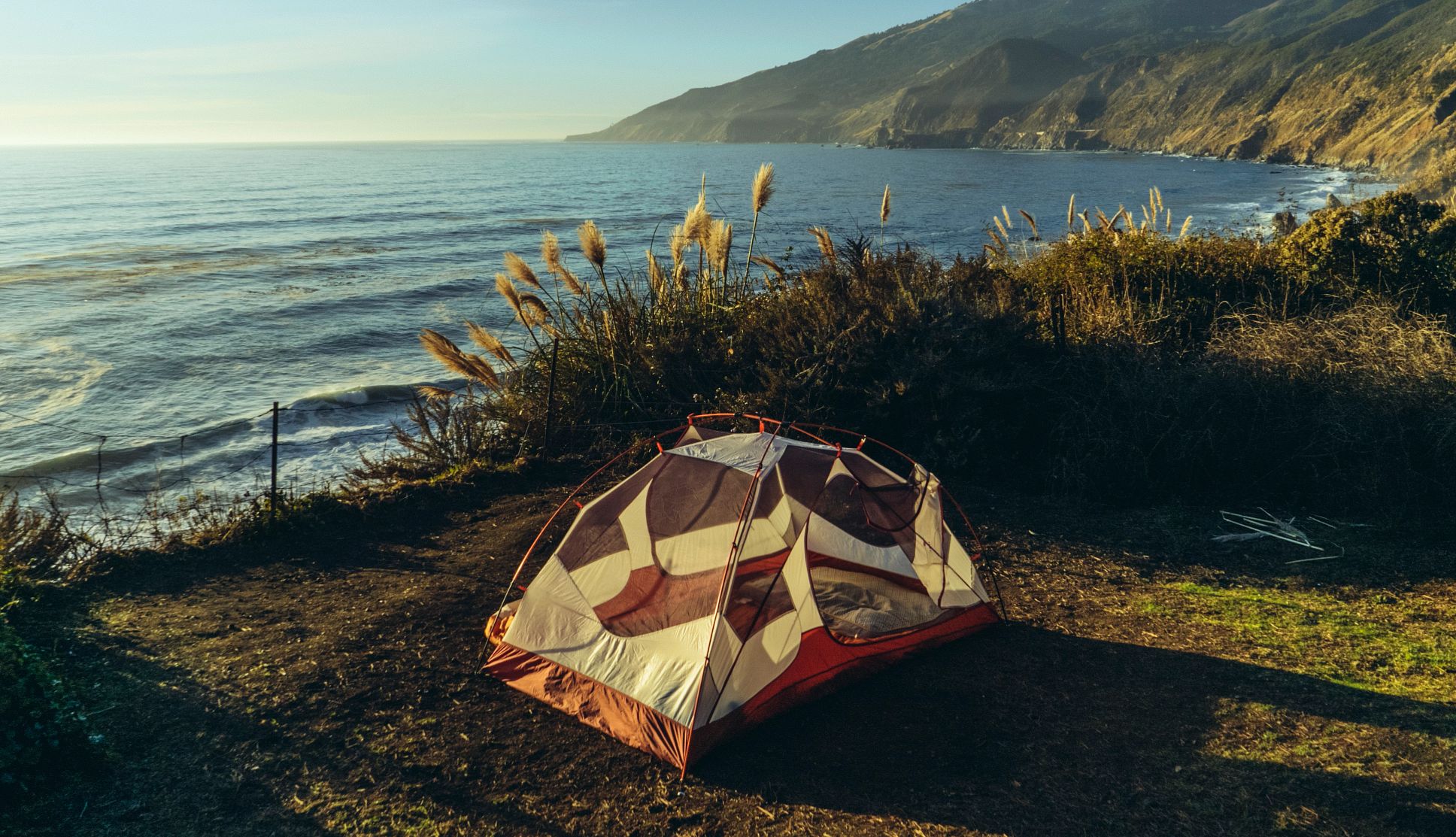 Campgrounds Near Scenic Drives a tent on an ocean bluff