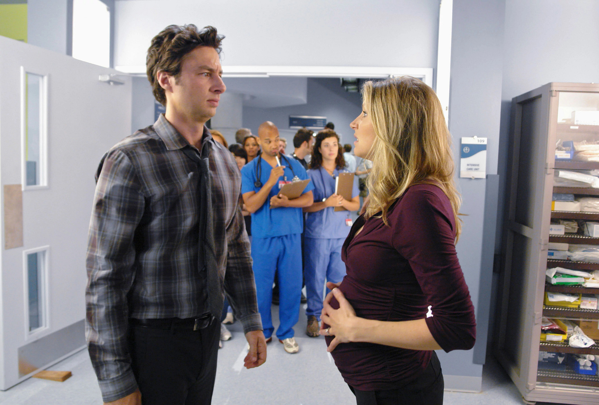 zach braff and sarah chalke in a scene from scrubs