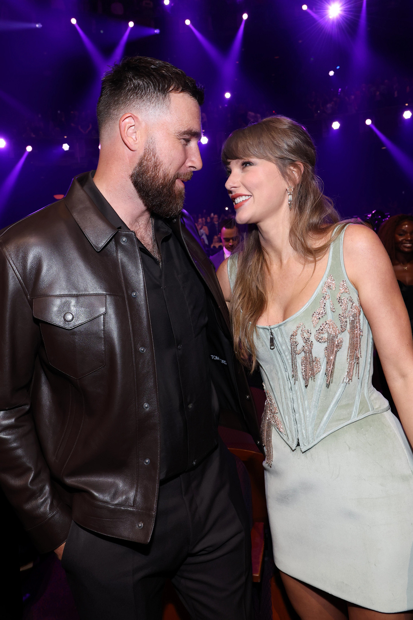 Travis Kelce and Taylor Swift talking during the 2026 iHeartRadio Music Awards.