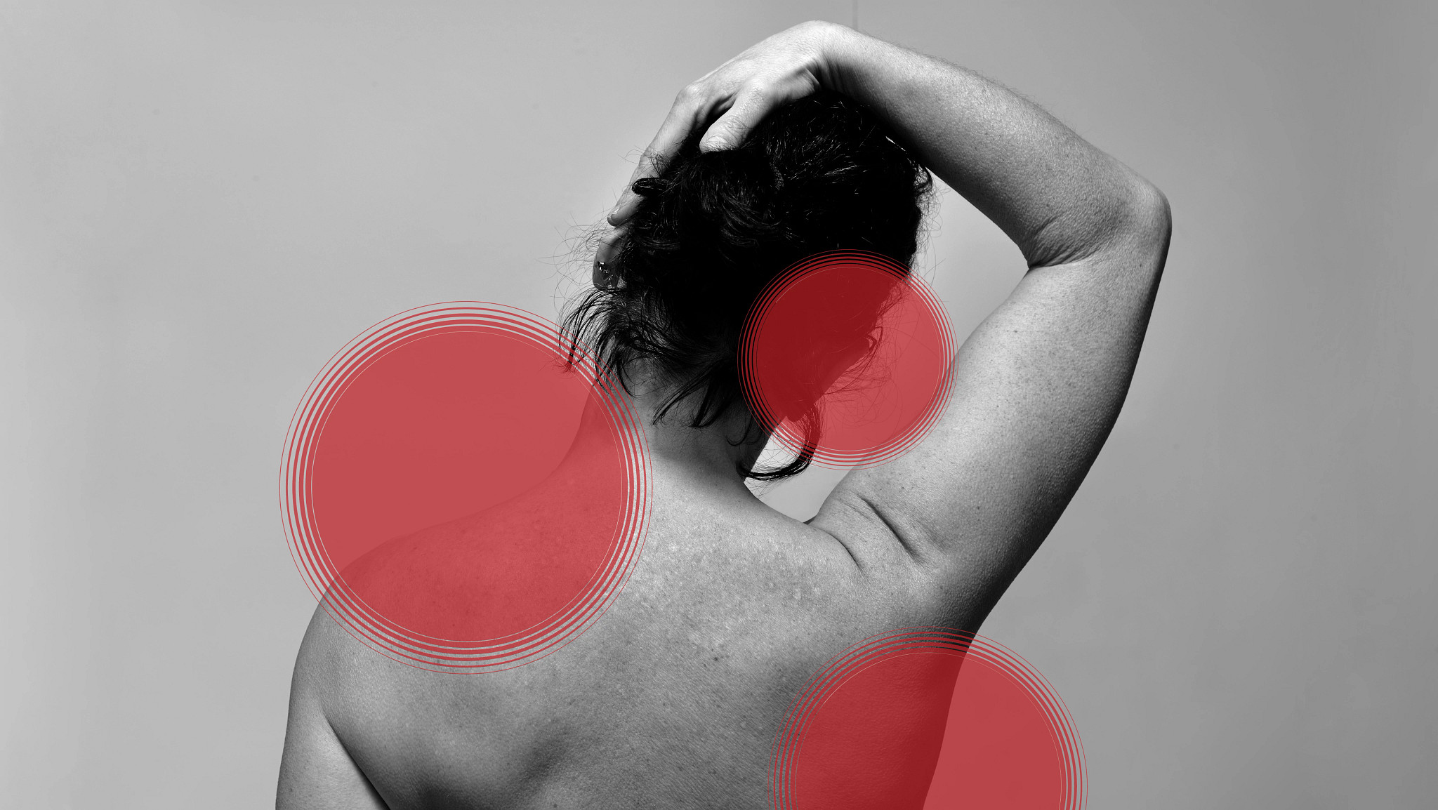 Black-and-white image of a woman stretching her neck, with red circles highlighting areas of tension in her neck and back.