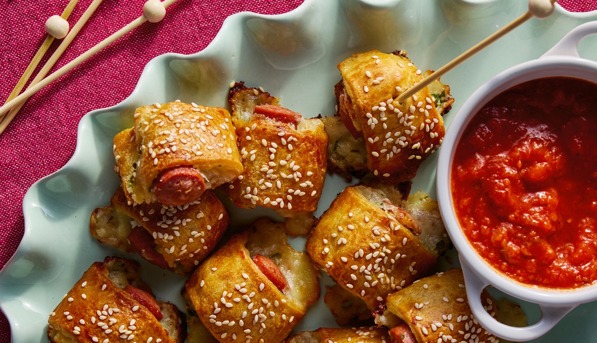 Savannah Guthrie’s Garlic Bread Pigs in a Blanket Savannah Guthrie’s Garlic Bread Pigs in a Blanket are pictured on tabletop, with marinara sauce on the side.
