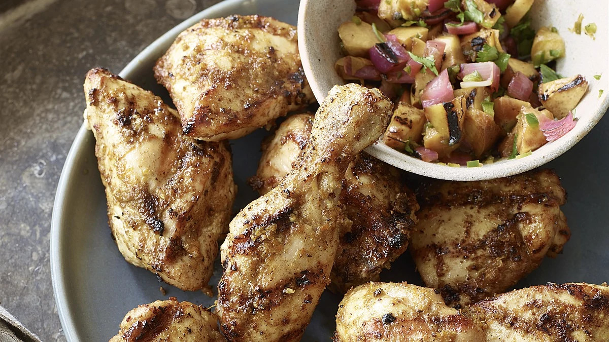 A close-up view of grilled peach-lime salsa on a plate