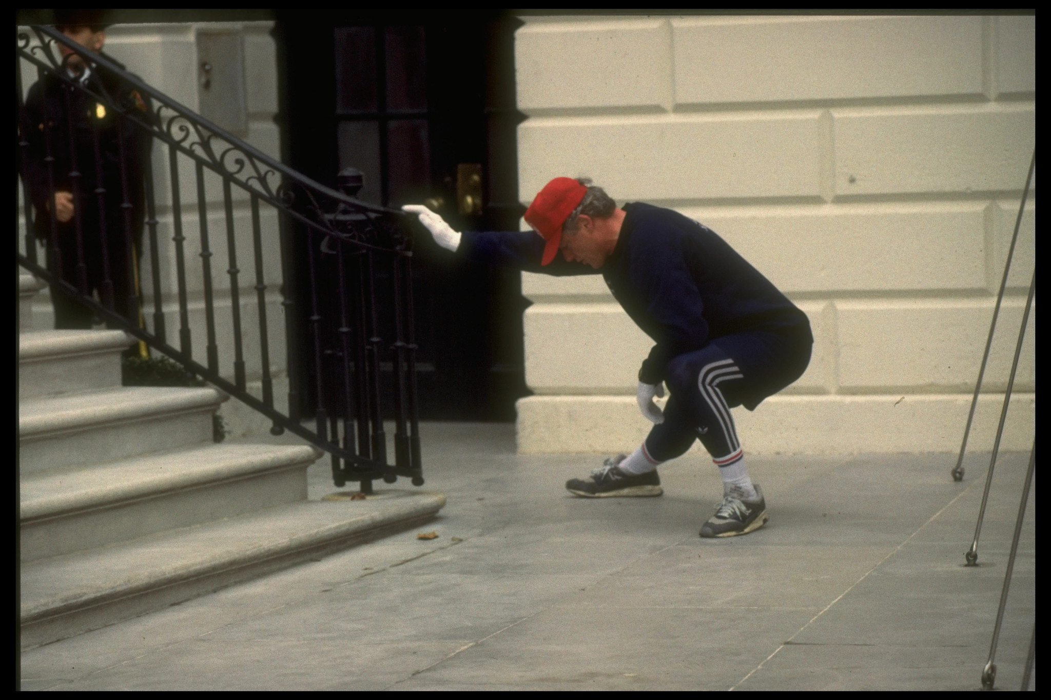 bill clinton stretches in jogging gear