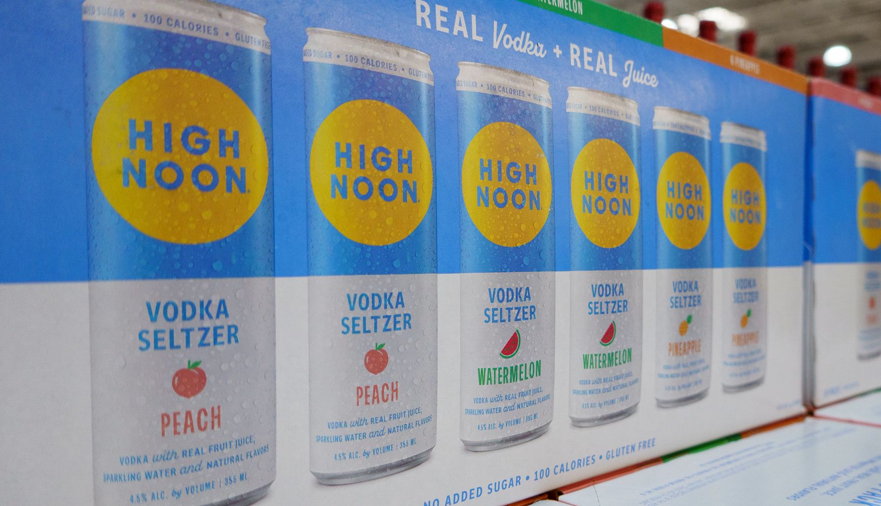 Recall Alert: High Noon and Celsius Products Label Mix-Up Cases of High Noon vodka seltzer are stacked for sale.