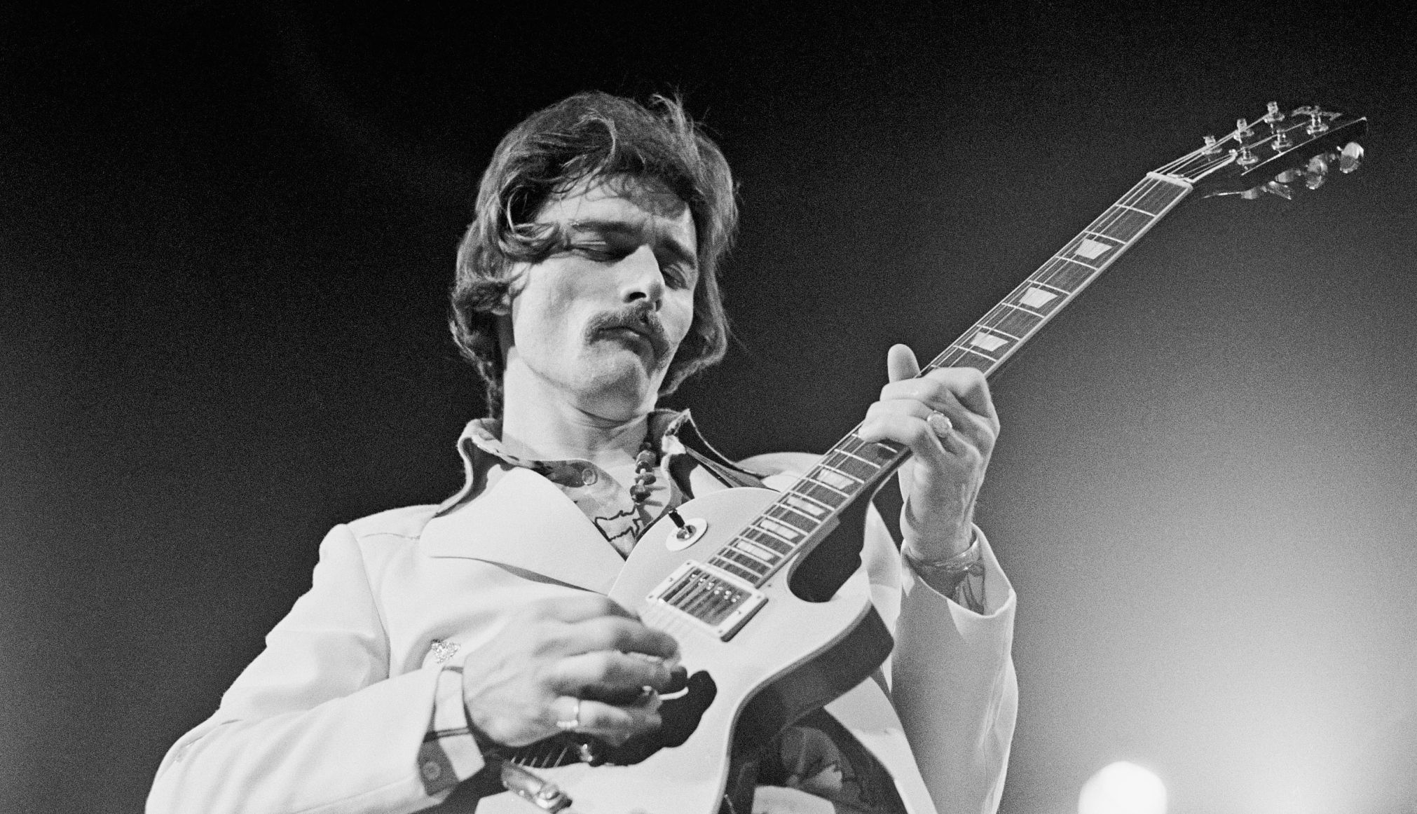 Allman Brothers Band Co-founder Dickey Betts Dies at 80 dickey betts performs on stage