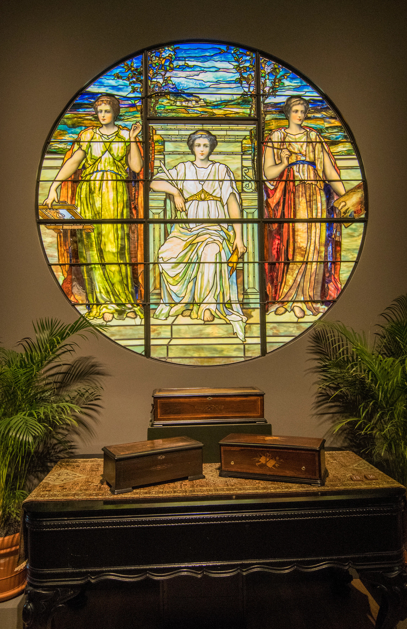 glass windows and lamps, mosaics, art glass, jewelry, and paintings