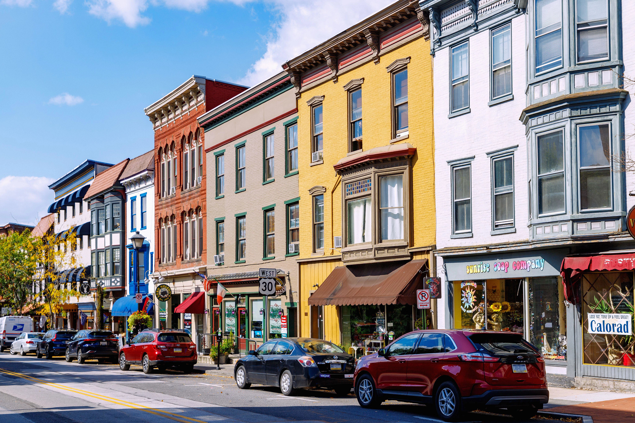 multi colored buildings near a street