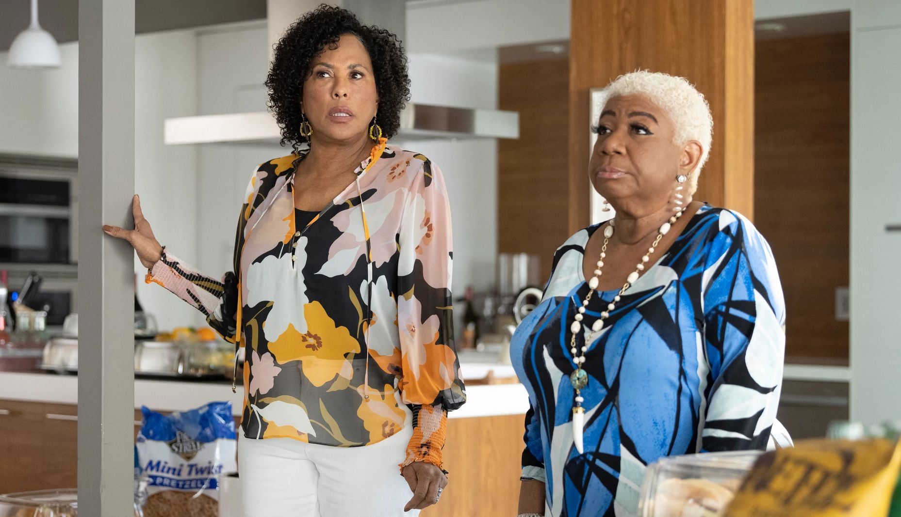 Angela E. Gibbs and Luenell standing next to each other in a scene from Hacks